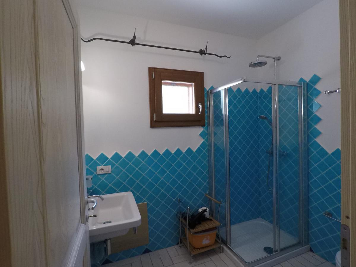 La Corte Degli Ulivi Appartamenti Cala Liberotto Bagian luar foto
